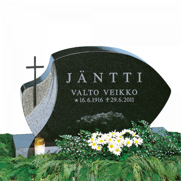Musta hautakivi, kukkia ja kynttilä.