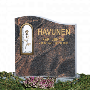 Punainen hautakivi, nimi ja päivämäärät.